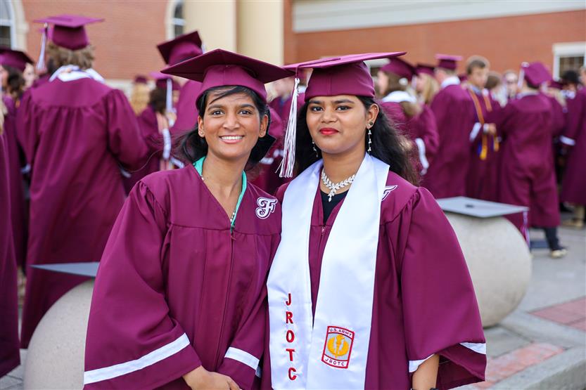 Graduates wearing maroon robes